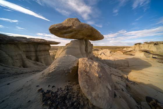 Carefully balanced caprock Balanced Caprock near The King of WIngs in Ah-Shi-Sle-Pah Wash, New Mexico