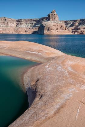 The Big Pool Shoreline The Big Pool is a reflecting pool in Last Chance Bay on Lake Powell
