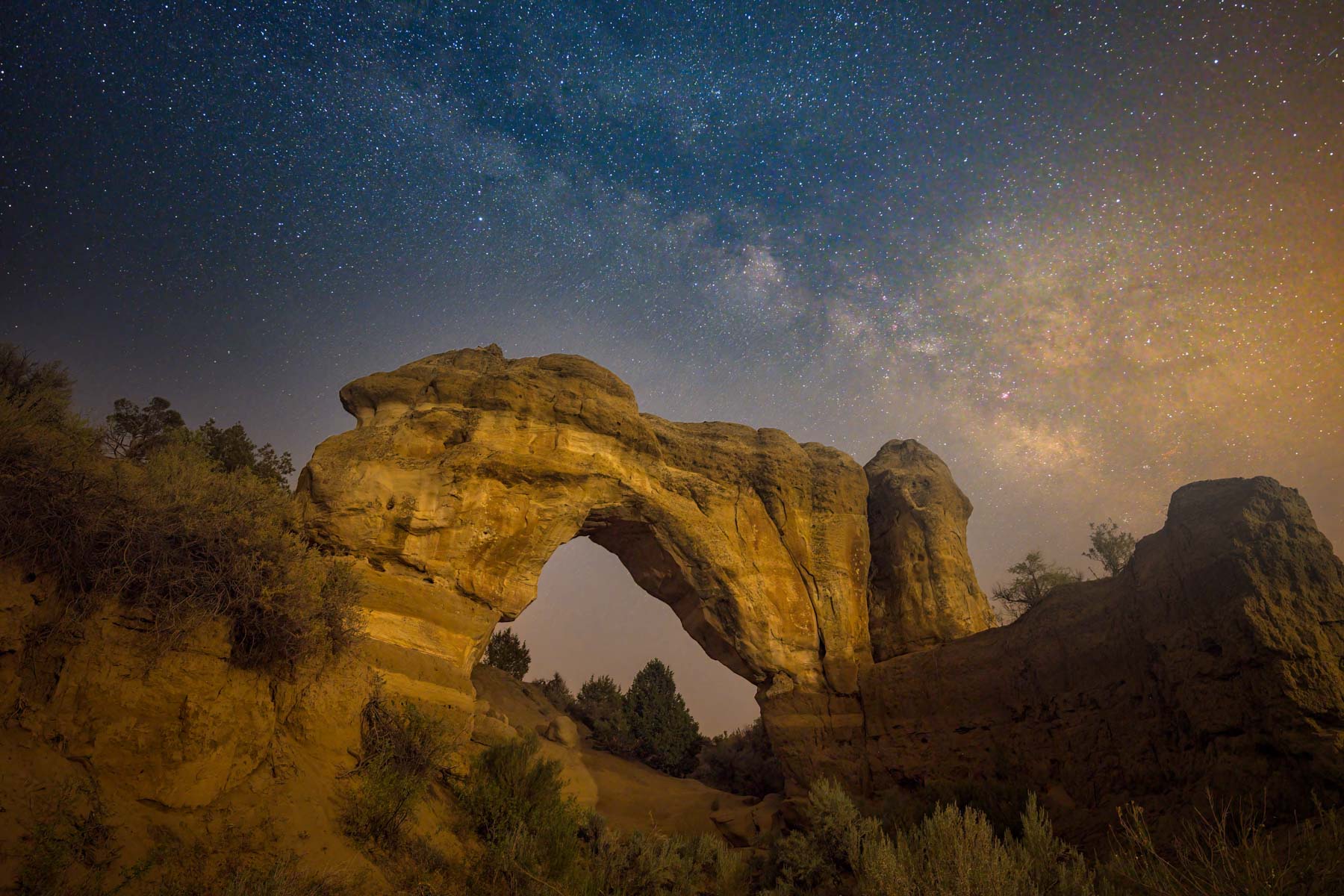 The Milky Way over Arch Rock near Aztec, New Mexico