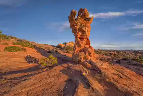 The Olympic Torch at Sunrise 2 The Olympic Torch rock formation in the Cottonwood Cove area of Coyote Buttes South, Arizona