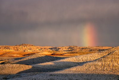 20231029Utah0021-Edit Stormy clouds and rainbow at sunset in Hanksville, Utah