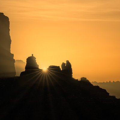 Snoopy Sunrise Snoopy Rock with sun star at sunrise in Sedona, AZ