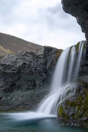 Skutafoss Long Exposure Skutafoss waterfall seen from alcove on the river Þorgeirsstaðaá in Iceland.