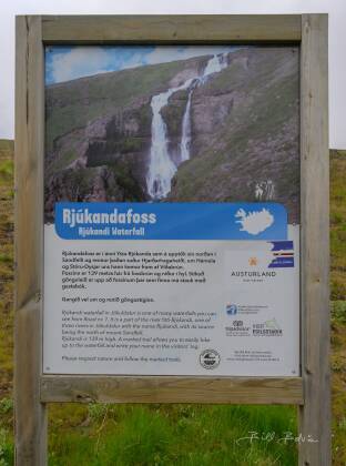 Rjukandafoss Sign Sign about the Rjukandafoss , aka the Rjukandi waterfalls on the Ring Road, Iceland. Lots of mist which sometimes blows upwards.