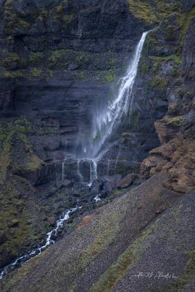Windswept Falls A waterfall puished upwards by a stroin wind. The watferall is near Haifoss in Iceland.