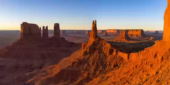 Stagecoach Butte 1 Aerial of Monument Valley showing from right to left Brigham Young's Tomb, King on his Throne, and Stagecoach Butte. Image taken at sunrise.