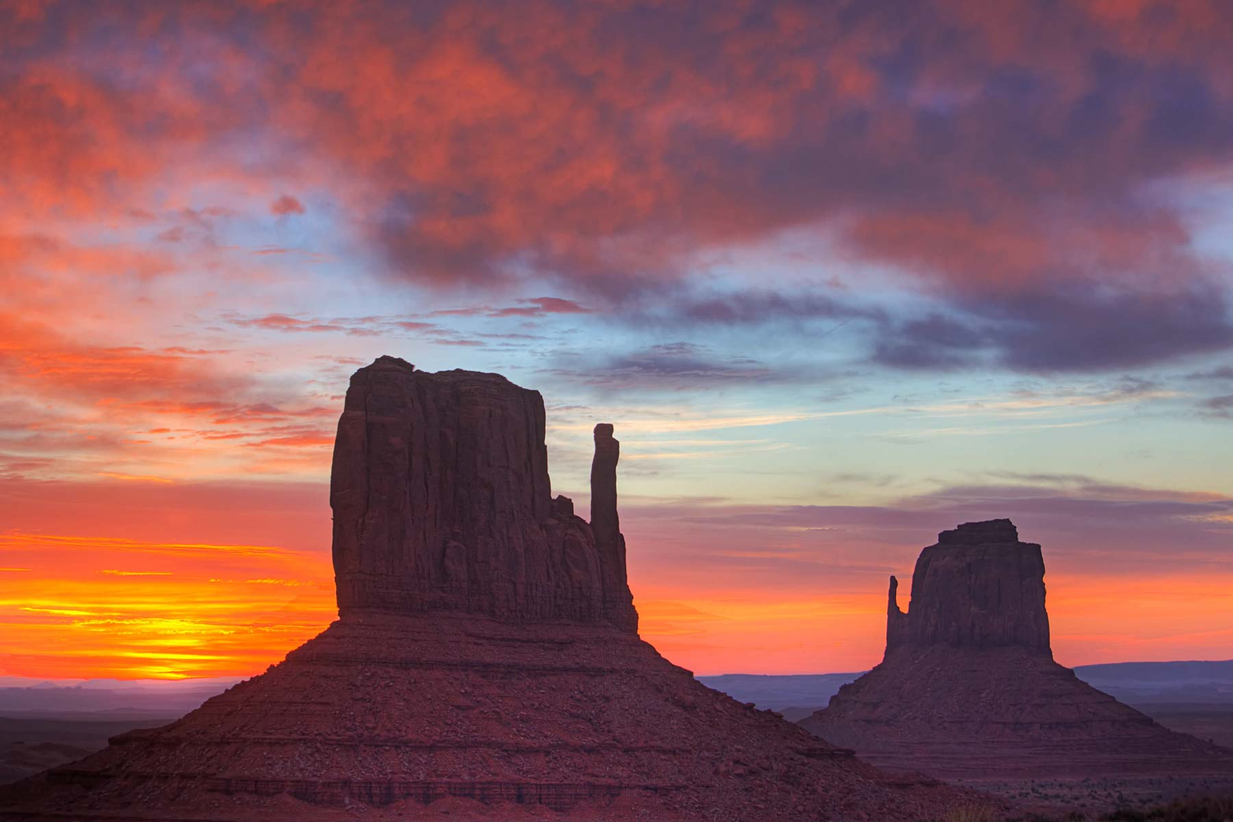 he Mittens in Monument Valley at sunrise