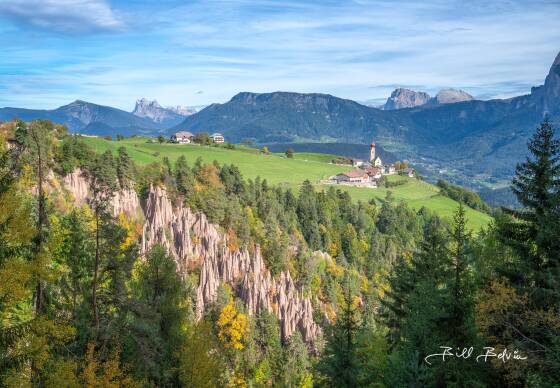 The Earth Pyramids 1 The Earth Pyramids and St. Nicholas Church in Mittelberg, the Dolomites, Italy.