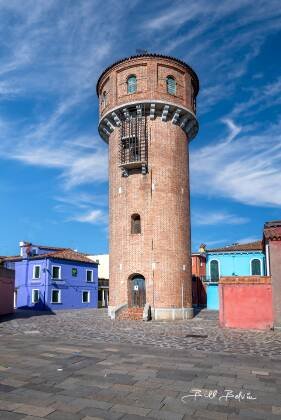 Water Tower Water Tower and colorful houses seen in Burano, Italy.