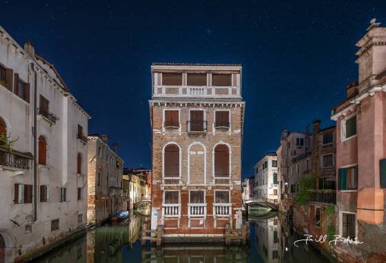 Ponte dei Conzafelzi 2 House surrounded by canals, seen from Ponte dei Conzafelzi, Venice, Italy.
