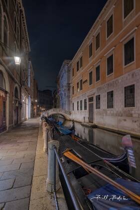 Venice Gondolas 1 Gondola seen at night in Venice, Italy