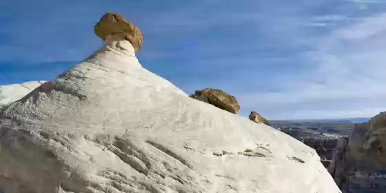 Dome Hoodoo A hoodoo on top of a dome seen at the rimrocks in Grand Stairacse Escalante NM, Utah.
