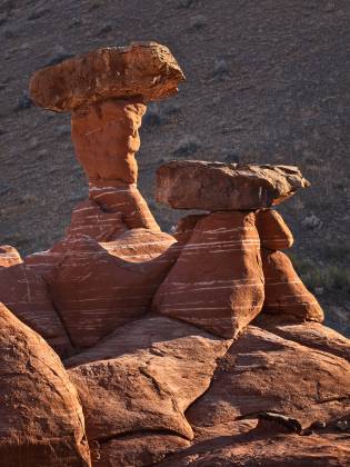 Hoodoos on rim at 300 mm Toadstool Hoodoo located in the Grand Staircase Escalante NM