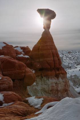 Toadstool Hoodoo Sunstar Toadstool Hoodoo located in the Grand Staircase Escalante NM just after a snow fall