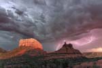Forked Lightning over Bell Rock in Sedona, Courthouse Butte to the left