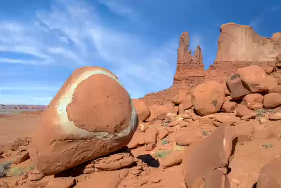 Round Boulder and The Pope Boulder field in front of The Pope rock formation, Round Rock, Arizona.