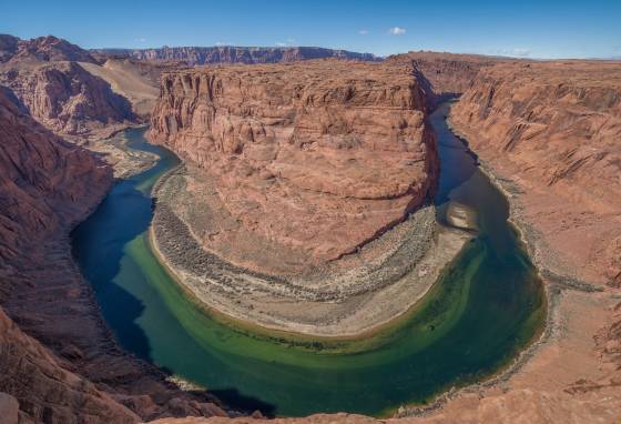 Waterholes Bend Waterholes Bend in the Colorado River, shot mid-day. A 16mm lens was needed to capture the full bend. The bend is much wider than Horseshoe Bend.